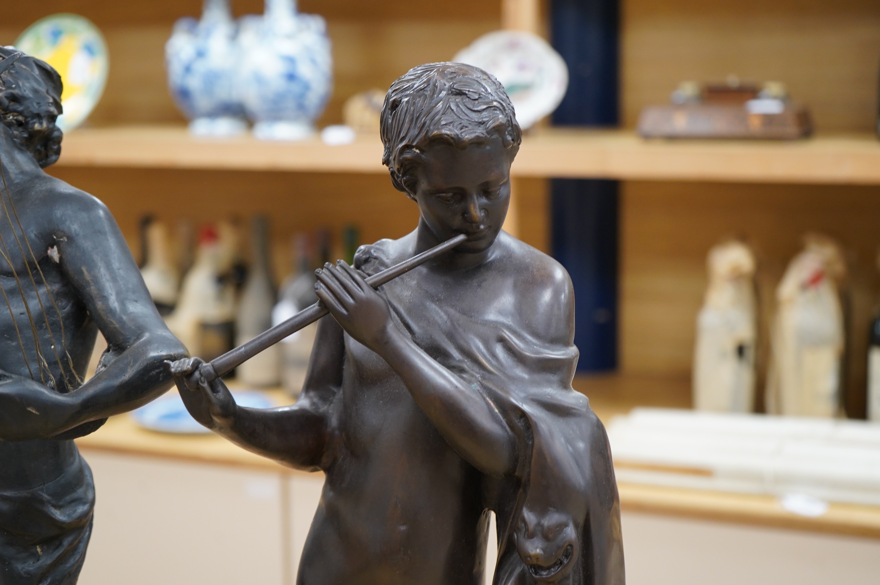 After the Antique, two spelter figures including a faun, largest 66cm high. Condition - fair